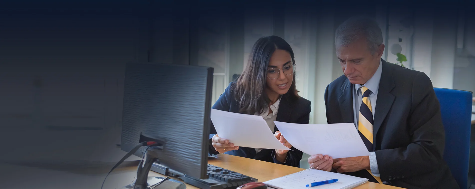 Specialized CPA and tax advisor review a high-earner client's portfolio to build, protect, and preserve wealth through advanced tax strategies.